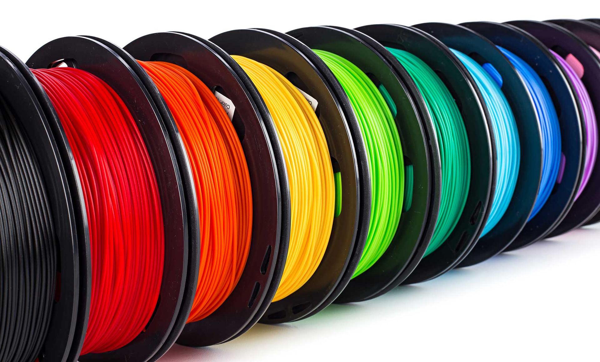 rolls of 3D print PLA filament in different colors